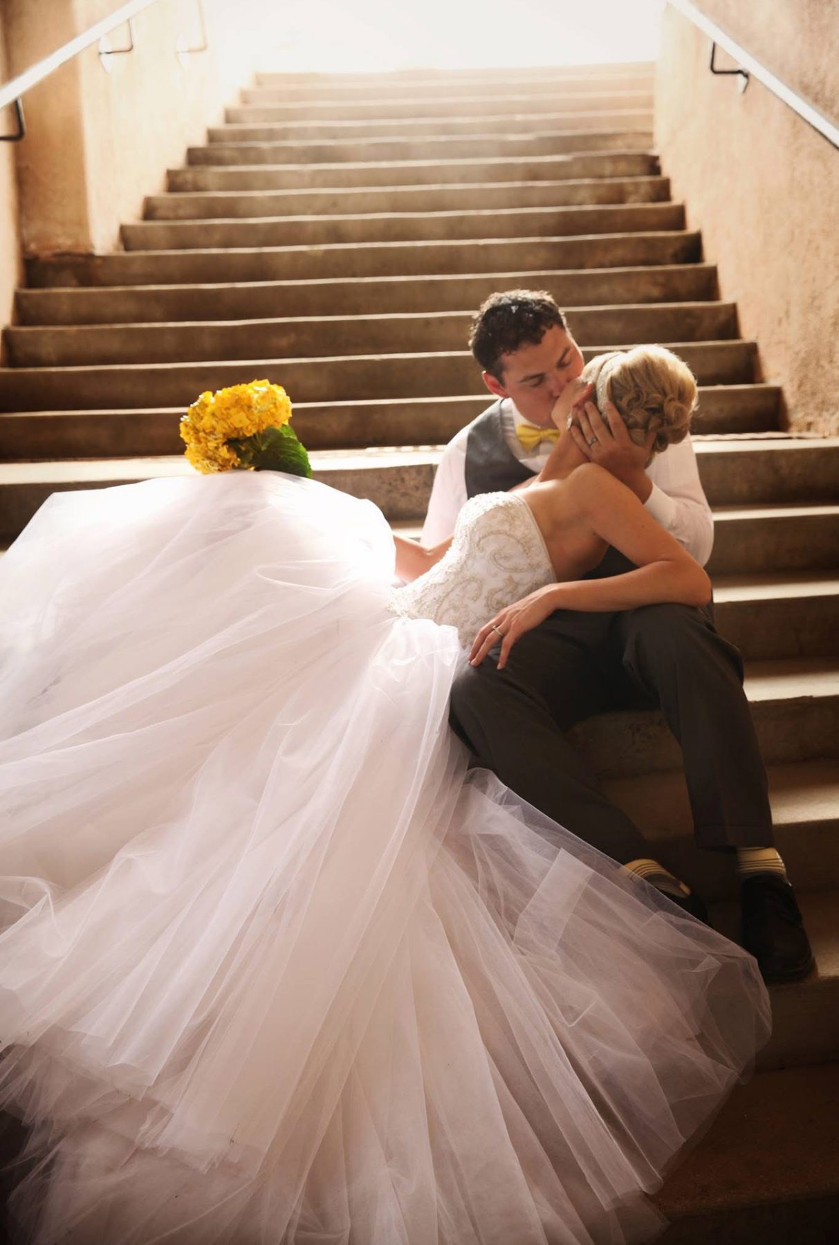 Couple sharing a quiet moment on a staircase